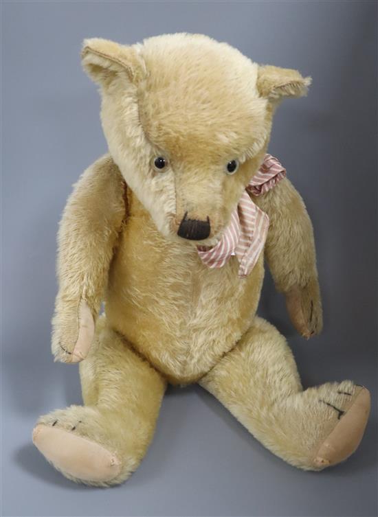 An English Chiltern type bear, 27in., good condition, original pads, glass eyes